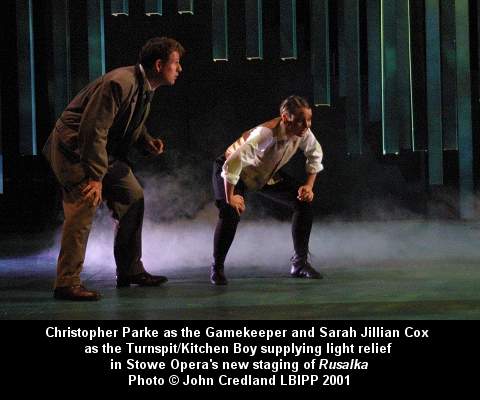 Christopher Parke as the Gamekeeper and Sarah Jillian Cox as the Turnspit/Kitchen Boy supplying light relief in Stowe Opera's new staging of 'Rusalka'.  © John Credland LBIPP 2001