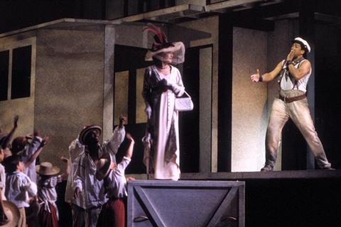 The diva Florencia Grimaldi (Patricia Schuman) boards the boat incognito while the mystical being Riolobo (Mark S Doss) - appearing here as a sailor - calls 'all aboard'. Photo: George Hixson/Houston Grand Opera