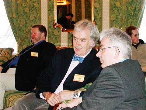 Mark Emney, composer of 'Dark Star' with blue bow tie, in conversation with accompanist John Lenehan. Photo © 2004 Howard Smith