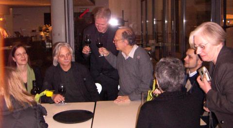 At the after-show party, from left to right: Anja Lechner, Manfred Eicher, Christoph Poppen, Valentyn Silvestrov, members of the orchestra and the translator. Photo © 2006 Sissy von Kotzebue