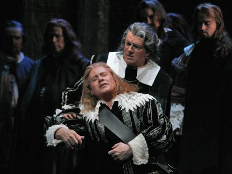 Tenor Richard Leech (Edgardo) falls into the arms of bass Reinhard Hagen (Raimondo) in San Diego Opera's 'Lucia di Lammermoor'. Photo © 2006 Ken Howard