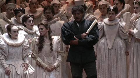 Desdemona (Krassimira Stoyanova) and Othello (José Cura) with members of the chorus in Act 3. DVD screenshot © 2006 Opus Arte/Gran Teatre del Liceu