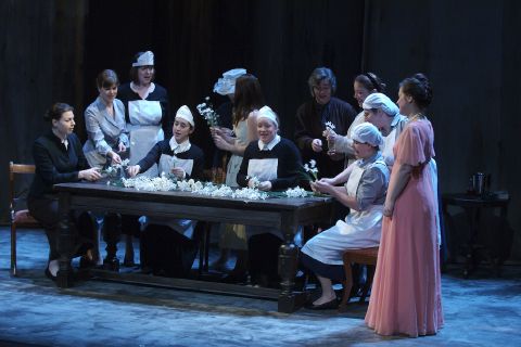 Katie Bird as the Countess Almaviva (right) with the below stairs chorus in Mozart's 'The Marriage of Figaro'