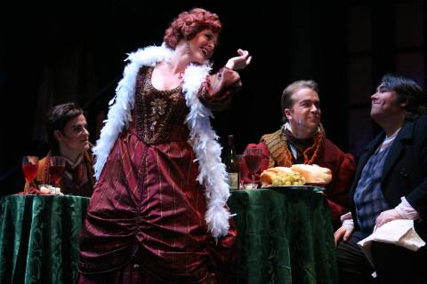 A flirtatious Musetta (Lisanne Norman) at the Cafe Momus (with Derek Taylor, Daniel Okulitch and Zdenek Plech). Photo © 2007 Victor Massaro 