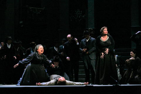 Judith Christin as Mama Lucia and Carter Scott as Santuzza with Turiddu (Richard Leech) dead. Photo © 2008 Ken Howard 